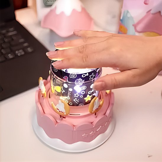 Veilleuse bébé carrousel rose à rotation avec motifs étoiles